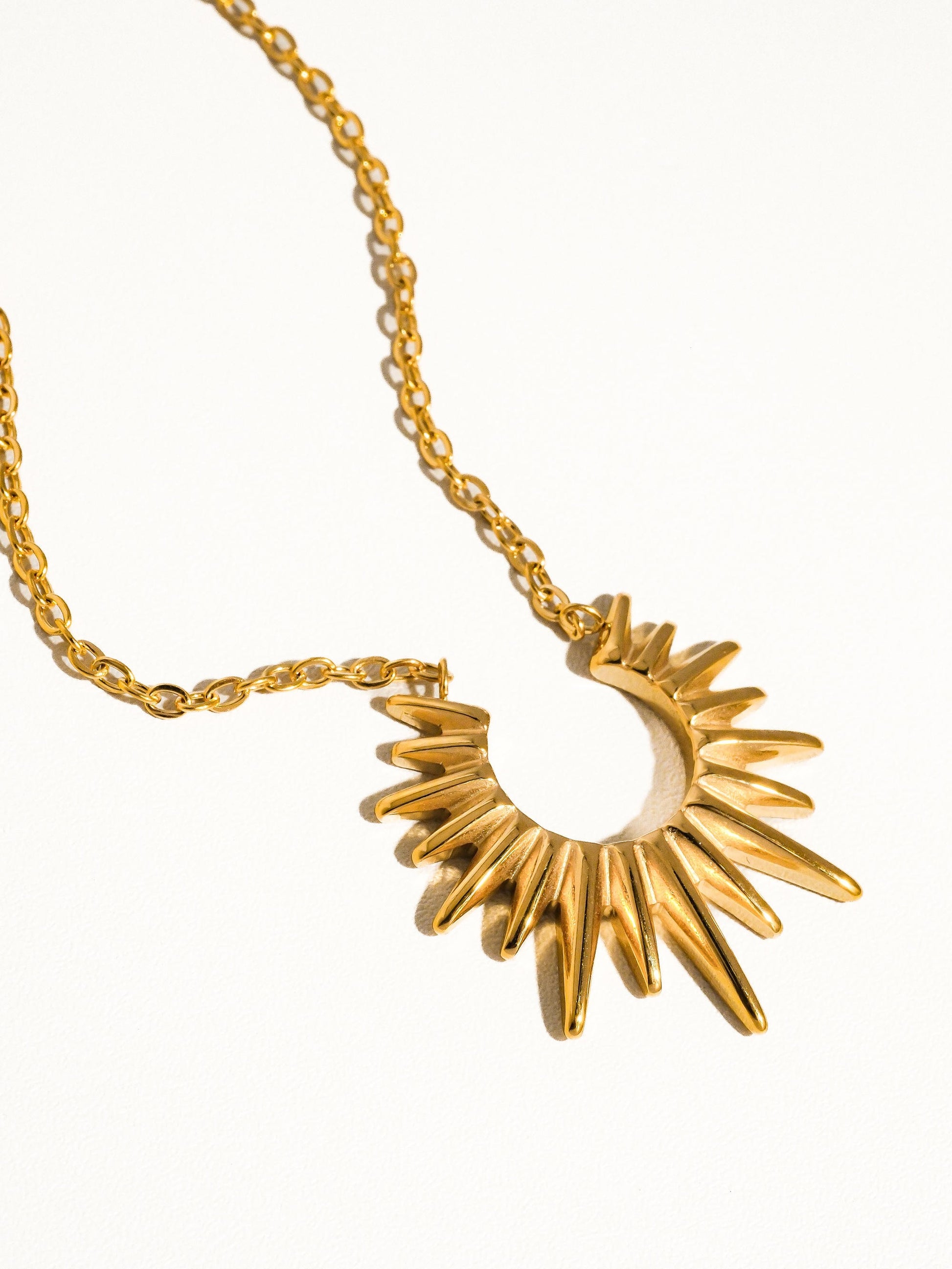 Sun Pendant on a white background.